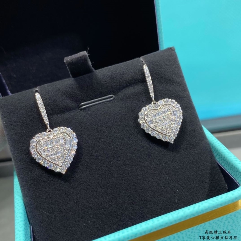 T*f*ny earrings